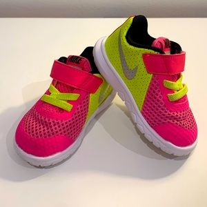 Neon pink and yellow infant Nike sneakers